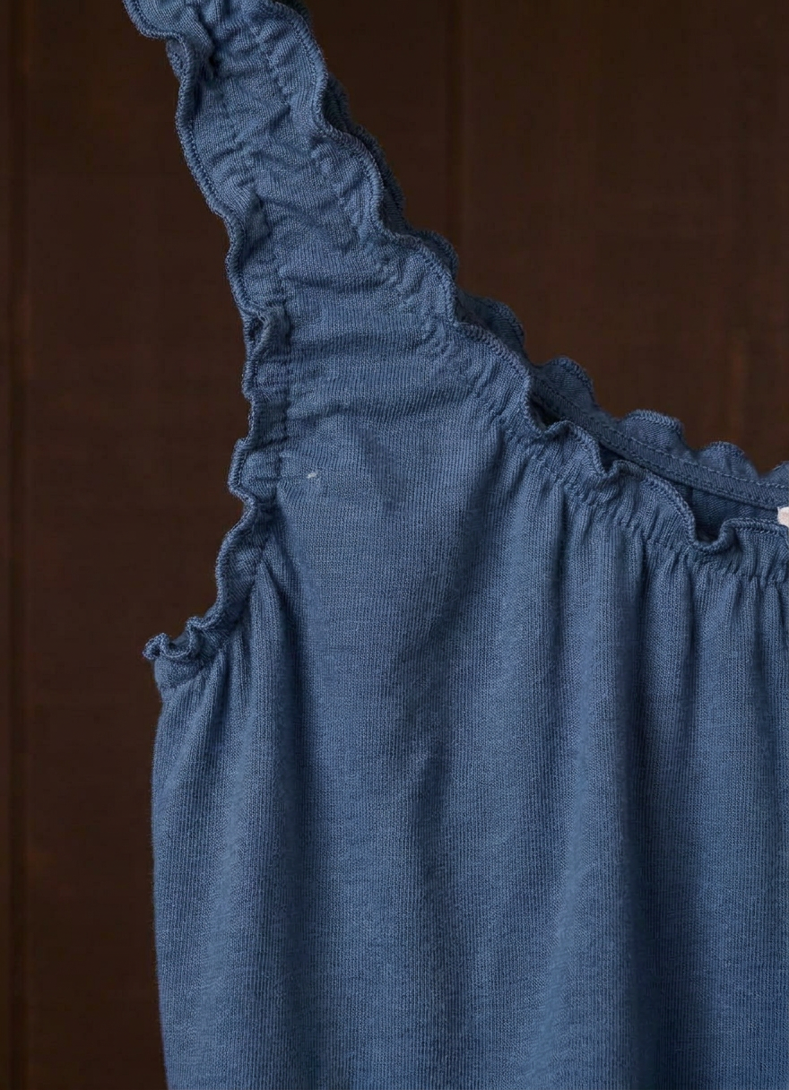Close-up of the indigo plant-dyed Cloud Camisoul gathered strap