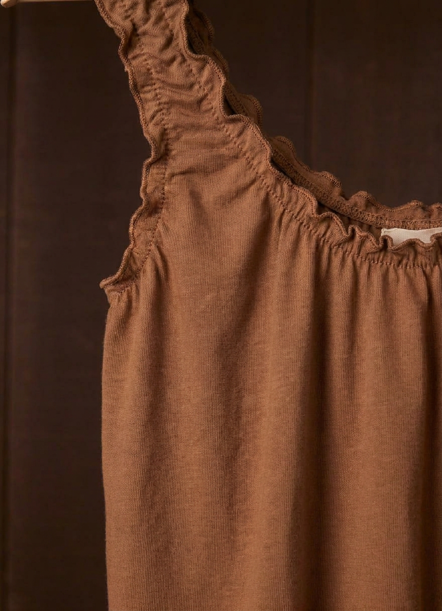 Close-up of the cutch plant-dyed walnut Cloud Camisoul gathered strap