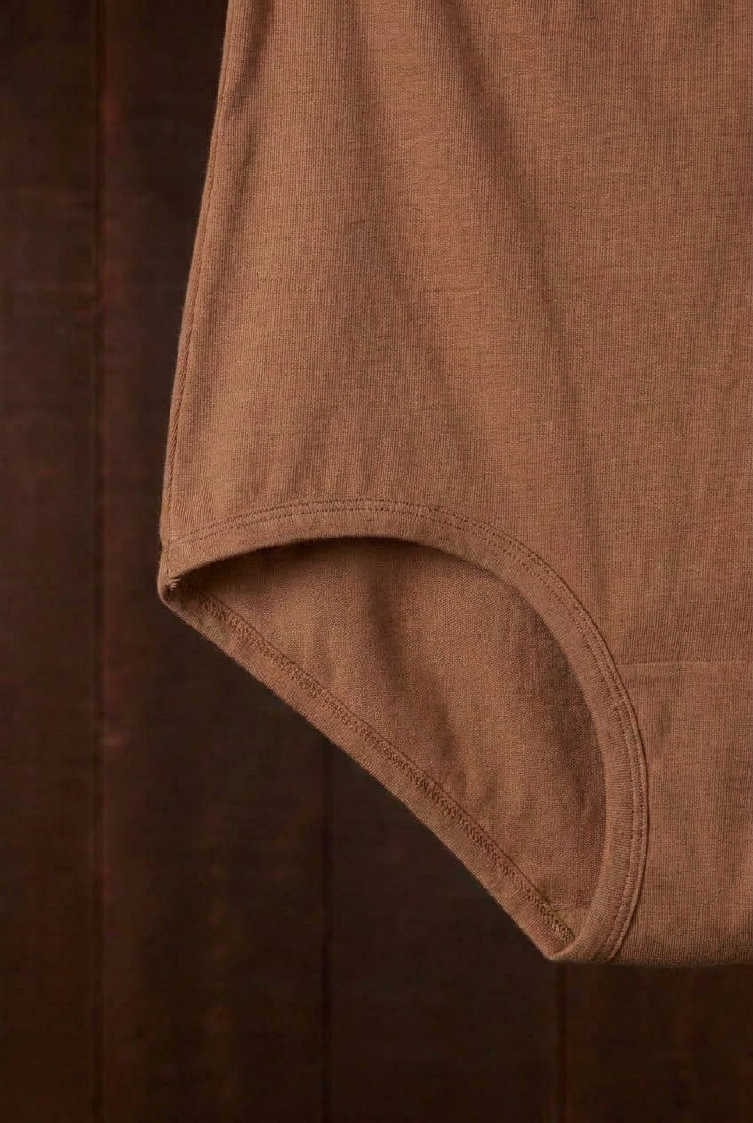 Close-up of the cutch plant-dyed walnut Mamita's Highwaist Panty leg edge