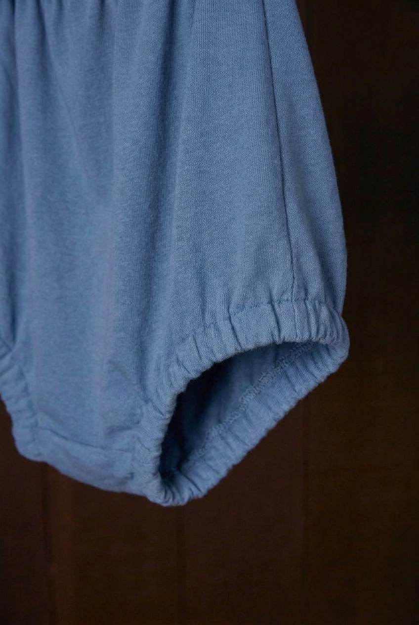 Close-up of the indigo plant-dyed Comfort Bloomer scrunchie leg band