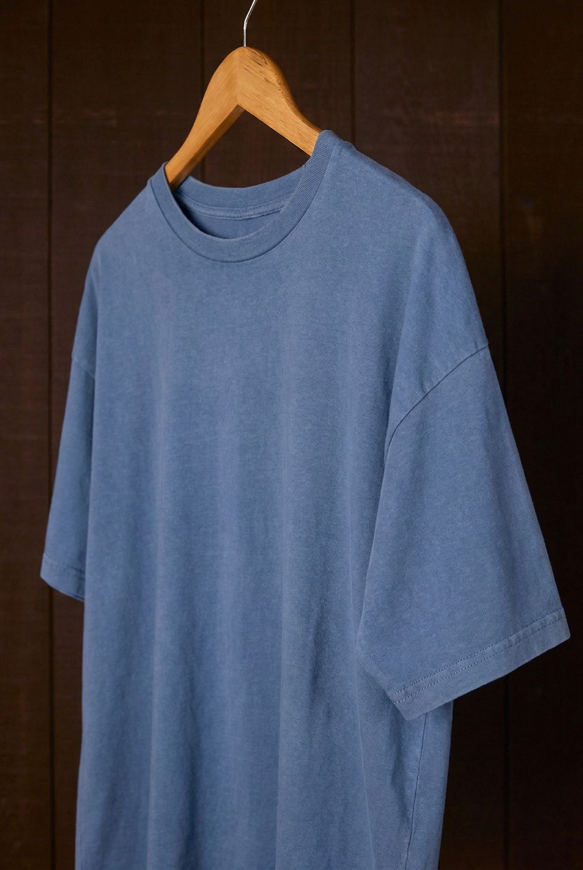 Close-up of the indigo plant-dyed Den Shirt neckline